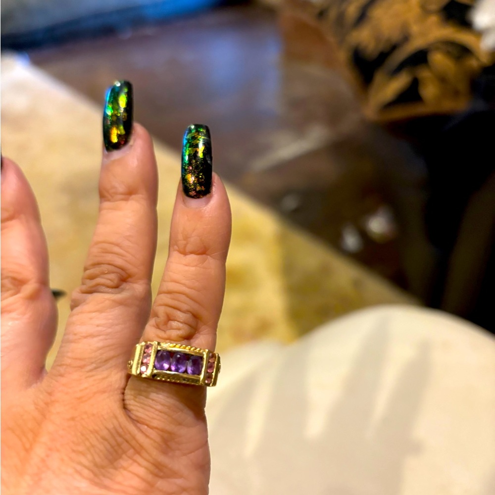 10 karat gold band, amethyst, stone with a pink sapphire size 5